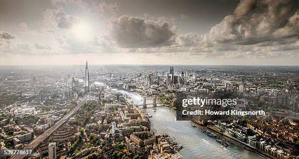 aeral view of london and the thames from the east - aerial view london stock-fotos und bilder