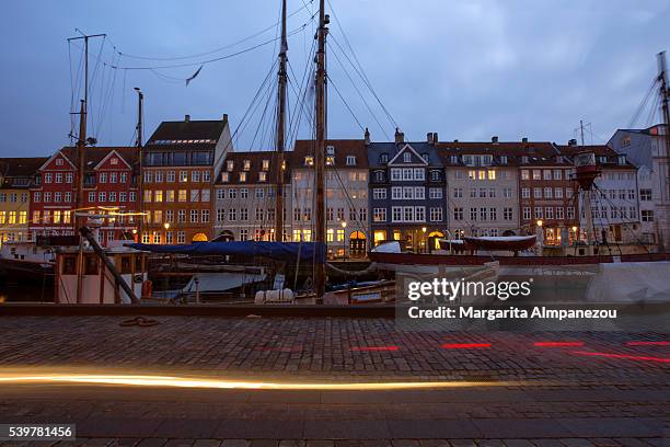 tail lights in copenhagen's nyhavn - canal disney stock pictures, royalty-free photos & images