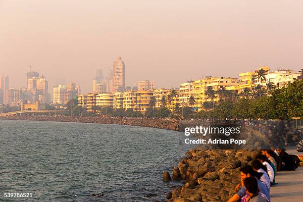 sunset on marine drive, mumbai - marine drive stock pictures, royalty-free photos & images