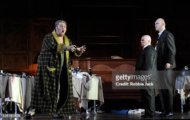 Ambrogio Maestri as Sir John Falstaff,Alasdair Elliott as Bardolfo and Lukas Jakobski as Pistola in the Royal Opera's production of Giuseppe Verdi's...