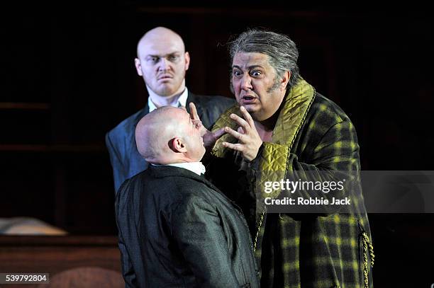 Ambrogio Maestri as Sir John Falstaff and Alasdair Elliott as Bardolfo with Lukas Jakobski as Pistola in the Royal Opera's production of Giuseppe...
