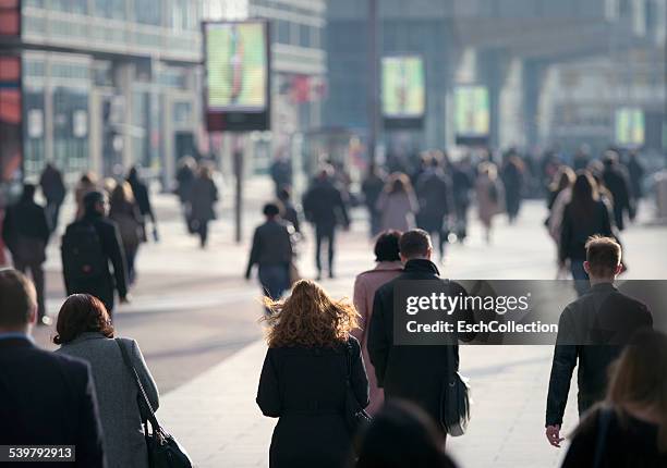 busy morning commute at business district in paris - la defense stock pictures, royalty-free photos & images