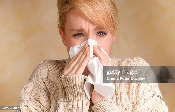 girl with cold and flu - sonarse fotografías e imágenes de stock