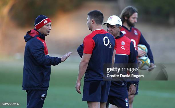 Eddie Jones, the England head coachtalks to Ben Youngs and skills coach Glen Ella during the England training session held at Scotch College on June...