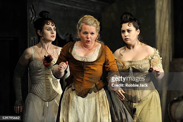 Elena Xanthoudakis as Clorinda, Elizabeth DeShong as Cenerentola and Victoria Yarovaya as Tisbe in Glyndebourne's production of Gioachino Rossini's...
