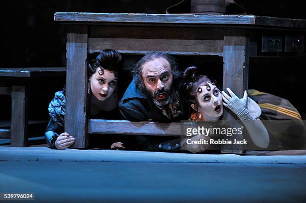 Victoria Yarovaya as Tisbe, Ubberto Chiummo as Don Magnifico and Elena Xanthoudakis as Clorinda in Glyndebourne's production of Gioachino Rossini's...