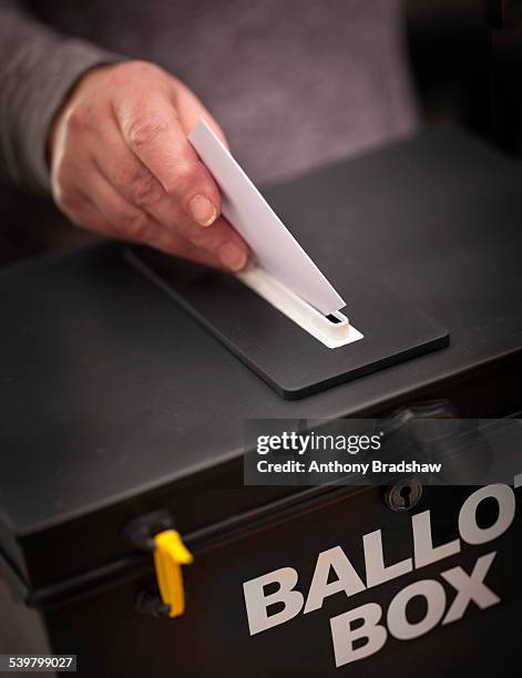 angled view of casting a vote - voting uk stock pictures, royalty-free photos & images