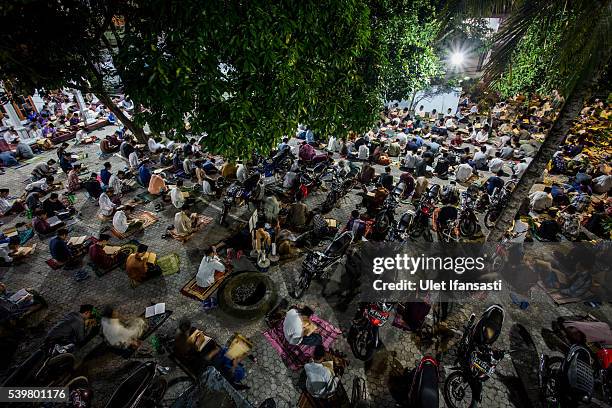 View of students learning Islamic scriptures at the islamic boarding school Lirboyo during the holy month of Ramadan on June 11, 2016 in Kediri, East...