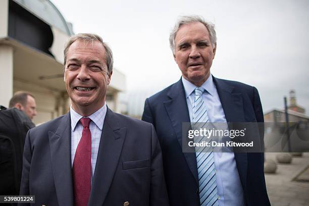 Leader Nigel Farage speaks with former Conservative Member of Parliament Jonathan Aitken during a walk about on June 13, 2016 in Ramsgate, England....