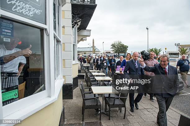 Independence Party leader Nigel Farage goes on the campaign trail for Brexit in Ramsgate on June 13, 2016. Britain's opposition Labour Party today...