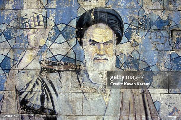 Collection of art work in the form of murals, billboards, banners and posters intended for propaganda purposes. Photographed on the streets of Tehran...