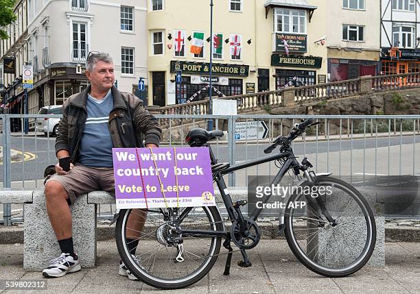 Independence Party supporters await the arrival of leader Nigel Farage as he goes on the campaign trail for Brexit in Ramsgate on June 13, 2016....