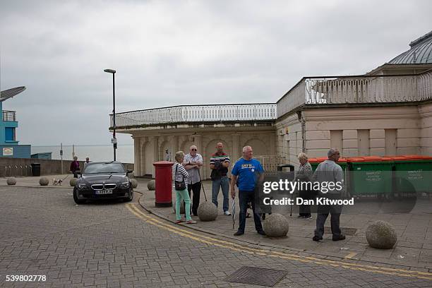 Small crowd gather to greet UKIP leader Nigel Farage who was in town for a walk about on June 13, 2016 in Ramsgate, England. Mr Farage will be...