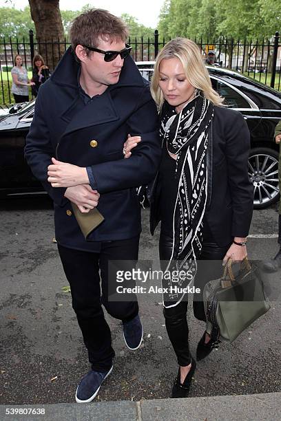 Kate Moss and her boyfriend Count Nikolai von Bismarck arrive at Lindley Hall for the Coach - s/s17 catwalk show on JUNE 13, 2016 in London, England.