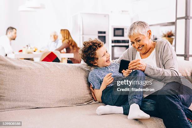 family texting - grandparents raising grandchildren stock pictures, royalty-free photos & images