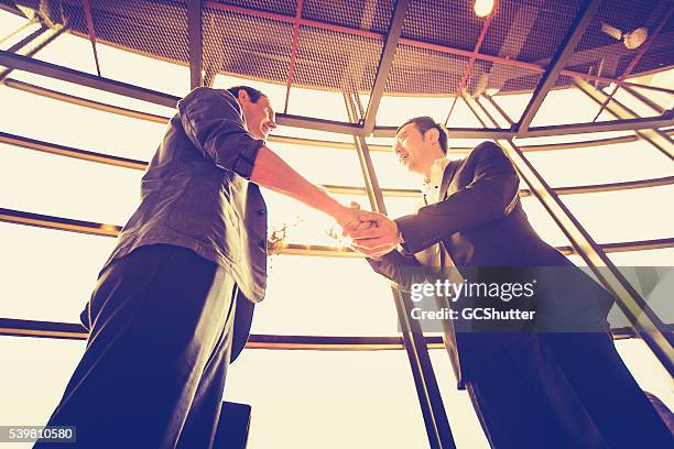 successful agreement over a profitable business. - cfo stock pictures, royalty-free photos & images