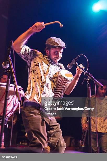 Brazilian musician Romulo Nardes plays percussion as he performs with the Afrobeat band Bixiga 70 at the 12th Annual GlobalFest on the Ballroom Stage...