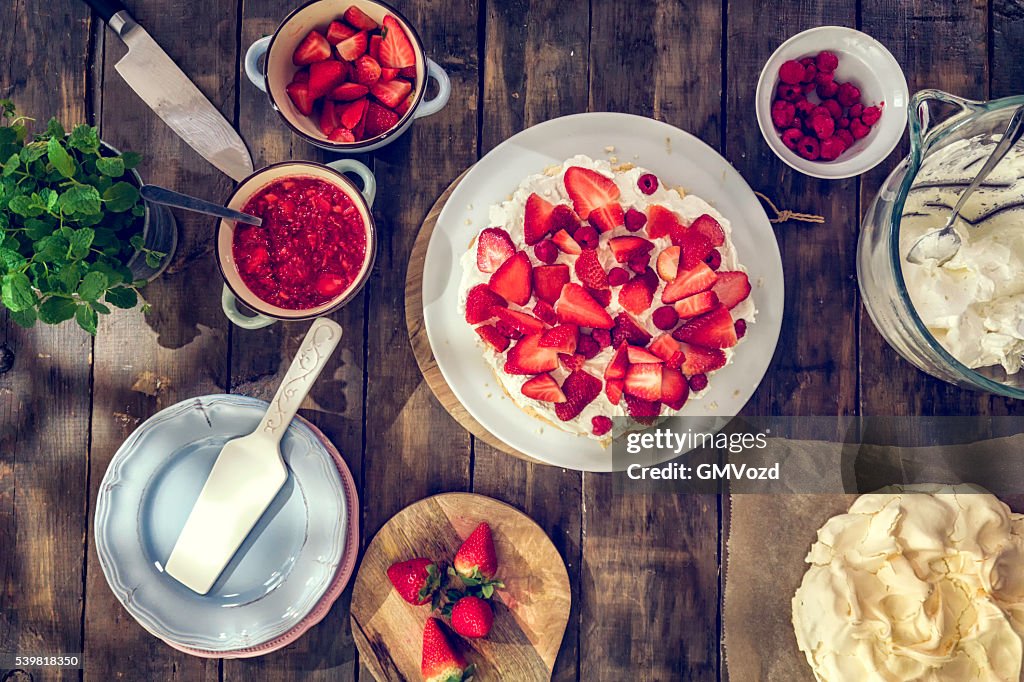 Delicious Berry Pavlova Cake with Strawberries and Raspberries