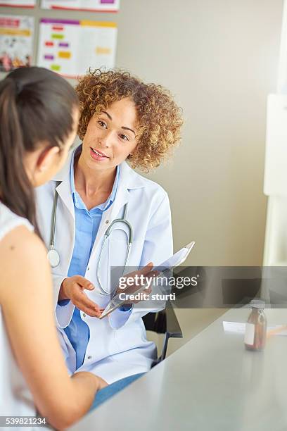 digital tablet prescription - female doctors and nurses stock pictures, royalty-free photos & images