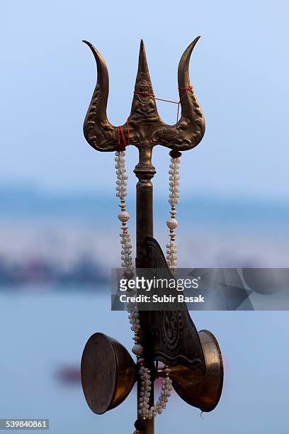 Closeup Of A Trident In Blue Backgroundvaranasi High-Res Stock Photo -  Getty Images