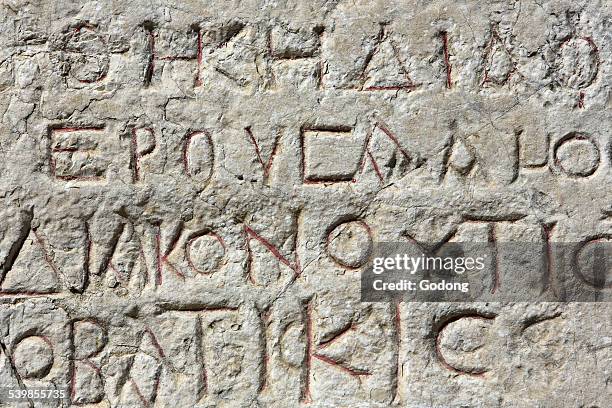 greek inscription - ancient greek alphabet stock-fotos und bilder