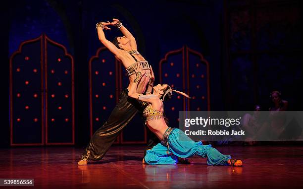 Yuliya Makhalina as Zobeide and Xander Parish as Golden Slave in the Kremlin Ballet's production after Michel Fokine's Scheherazade at the London...