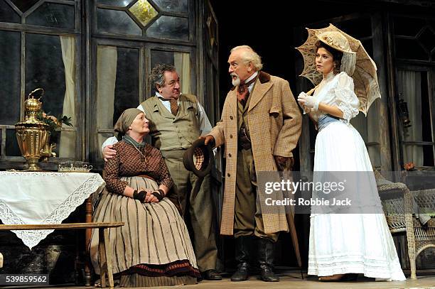 June Watson as Marina, Ken Stott as Uncle Vanya, Paul Freeman as Serebryakov and Anna Friel as Yelena in Anton Chekhov's Uncle Vanya directed by...