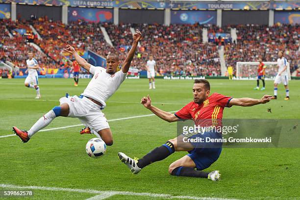 Jordi Alba of Spain and Theodor Gebre Selassie of Czech Republic compete for the ball during the UEFA EURO 2016 Group D match between Spain and Czech...