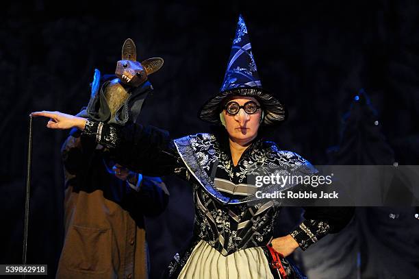 Kate Duchene as the Witch and Justin Salinger as Stuart the Bat in Lucy Kirkwood's Hansel and Gretel directed by Katie Mitchell at the National...