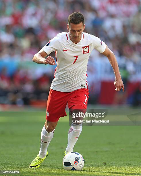Arkadiusz Milik of Poland controls the ball during the UEFA EURO 2016 Group C match between Poland v Northern Ireland at Allianz Riviera Stadium on...
