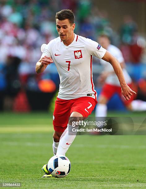 Arkadiusz Milik of Poland controls the ball during the UEFA EURO 2016 Group C match between Poland v Northern Ireland at Allianz Riviera Stadium on...