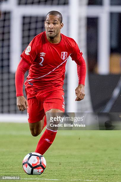 Alberto Rodríguez of Peru drives the ball during a group B match between Brazil and Peru at Gillette Stadium as part of Copa America Centenario US...