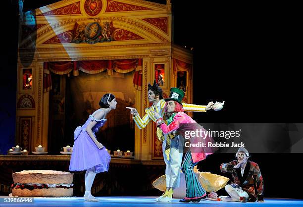 Beatriz Stix-Brunell as Alice,Ricardo Cervera as the March Hare, Alexander Campbell as the Mad Hatter and James Wilkie as the Dormouse in the Royal...