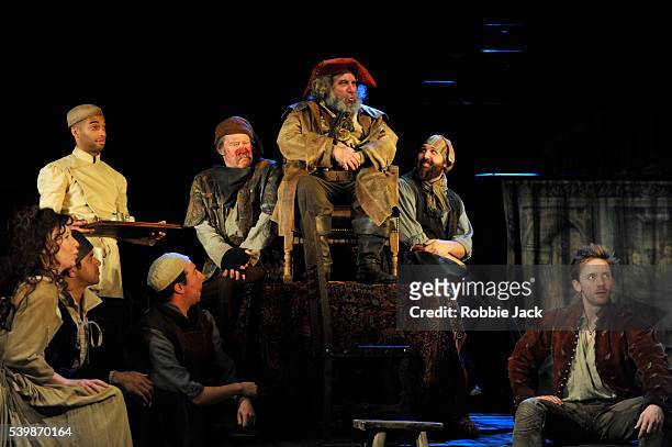 Antony Sher as Sir John Falstaff with artists of the company in the Royal Shakespeare Company's production of William Shakespeare's Henry IV part I...