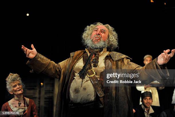 Antony Sher as Sir John Falstaff with artists of the company in the Royal Shakespeare Company's production of William Shakespeare's Henry IV part I...