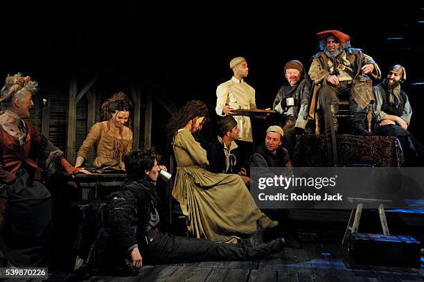 Antony Sher as Sir John Falstaff with artists of the company in the Royal Shakespeare Company's production of William Shakespeare's Henry IV part I...