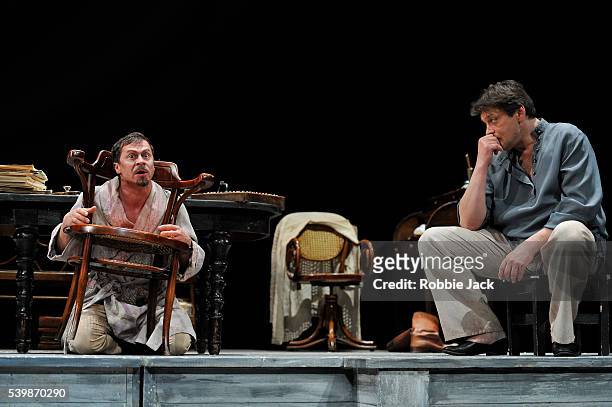 Pavel Derevyanko as Ivan Petrovich Voinitsky and Alexander Domogarov as Mikhail Lvovich Astrov in Moscow's Mossovet State Academic Theatre's...