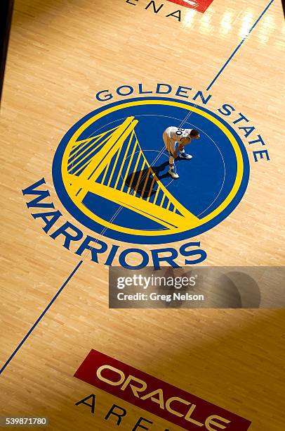 Finals: Aerial view of Golden State Warriors Stephen Curry at halfcourt standing on Warriors logo during game vs Cleveland Cavaliers at Oracle Arena....