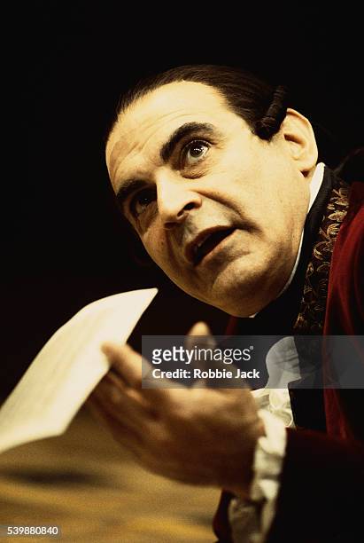 David Suchet, as Antonio Salieri, performs in Peter Shaffer's Amadeus at the Old Vic Theatre in London, England.