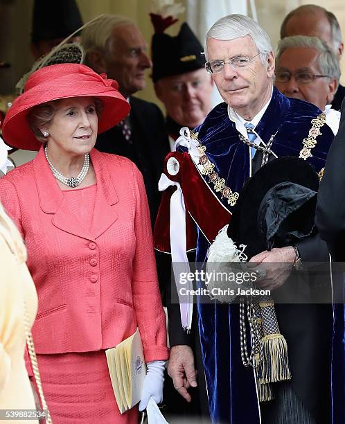 Sir John and Norma Major attend the Order of the Garter Service at Windsor Castle on June 13, 2016 in Windsor, England. Today the traditional Garter...