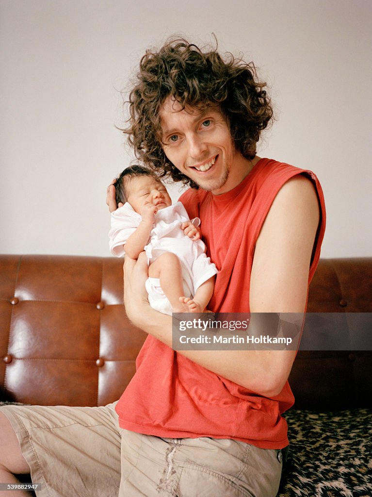 Father holding baby