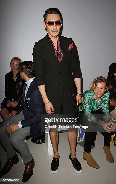 Hu Bing attends the Songzio show during The London Collections Men SS17 at BFC Show Space on June 13, 2016 in London, England.