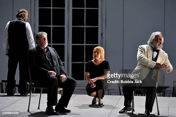 Iain Paterson as Kurwenal, Stephen Gould as Tristan, Nina Stemme as Isolde and John Tomlinson as King Marke in Richard Wagner's Tristan Und Isolde...