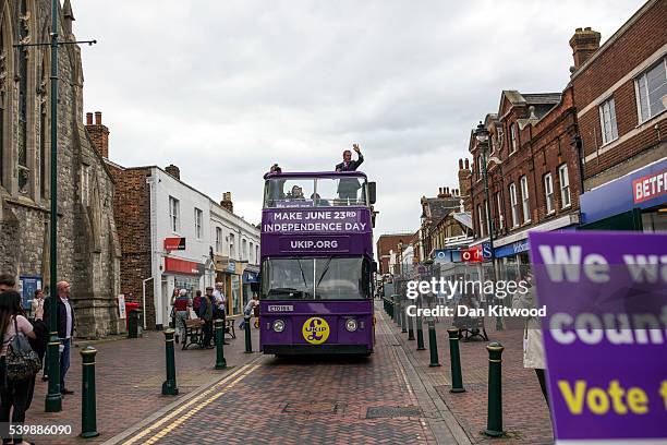 Leader Nigel Farage arrives for a walk about on June 13, 2016 in Sittingbourne, England. Mr Farage will be spending the day driving around the region...