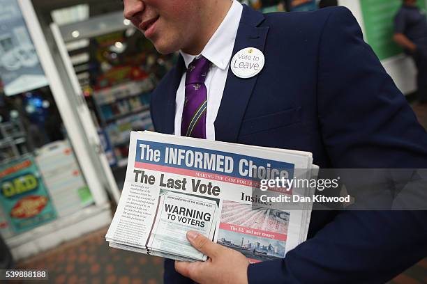 Supporter holds a copy of 'The Informed Choice' leaflet during a walk about on June 13, 2016 in Sittingbourne, England. Mr Farage will be spending...