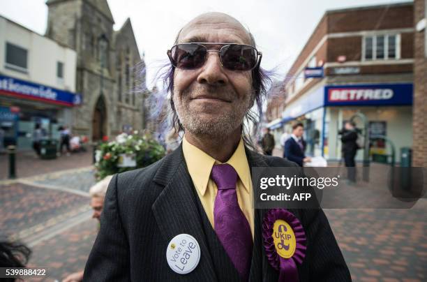 Independence Party supporter poses in Sittingbourne as leader Nigel Farage campaigns for Brexit on June 13, 2016. Britain's opposition Labour Party...