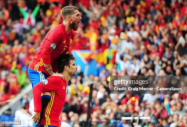 Spain's Gerard Pique celebrates scoring the opening goal with team-mate Sergio Ramosduring the UEFA Euro 2016 Group E match between Republic of...