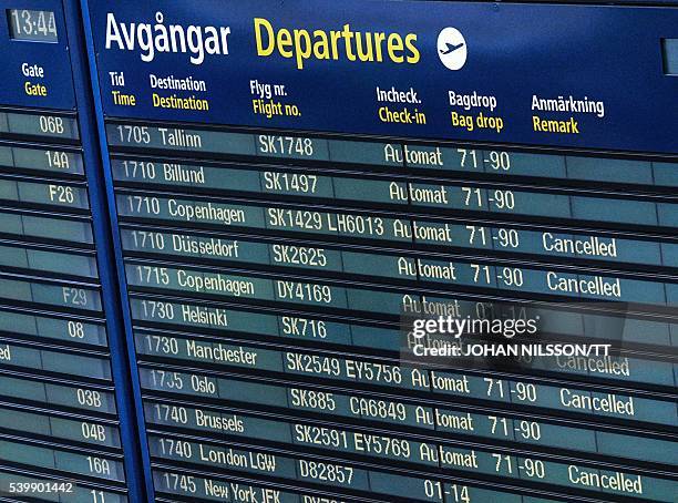 Cancelled flights of Scandinavian Airlines SAS are seen on the info board at Arlanda airport north of Stockholm, Sweden, June 13, 2016. SAS cancelled...