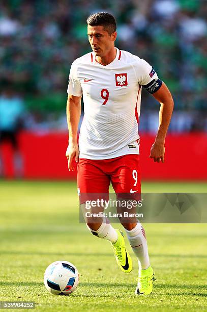 Robert Lewandowski of Poland runs with the ball during the UEFA EURO 2016 Group C match between Poland and Northern Ireland at Allianz Riviera...