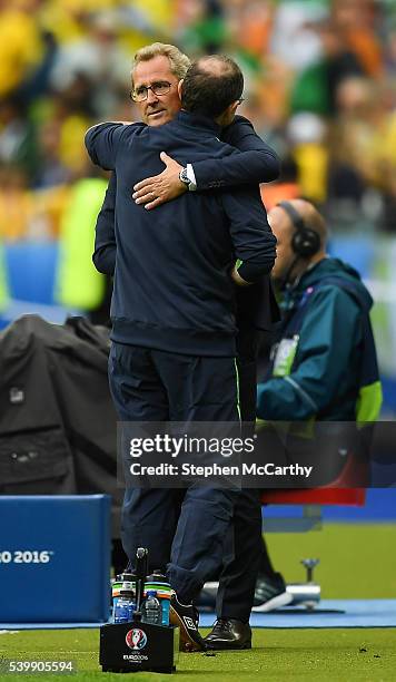 Paris , France - 13 June 2016; Republic of Ireland manager Martin O'Neill, left, and Sweden manager Erik Hamrén embrace after the UEFA Euro 2016...